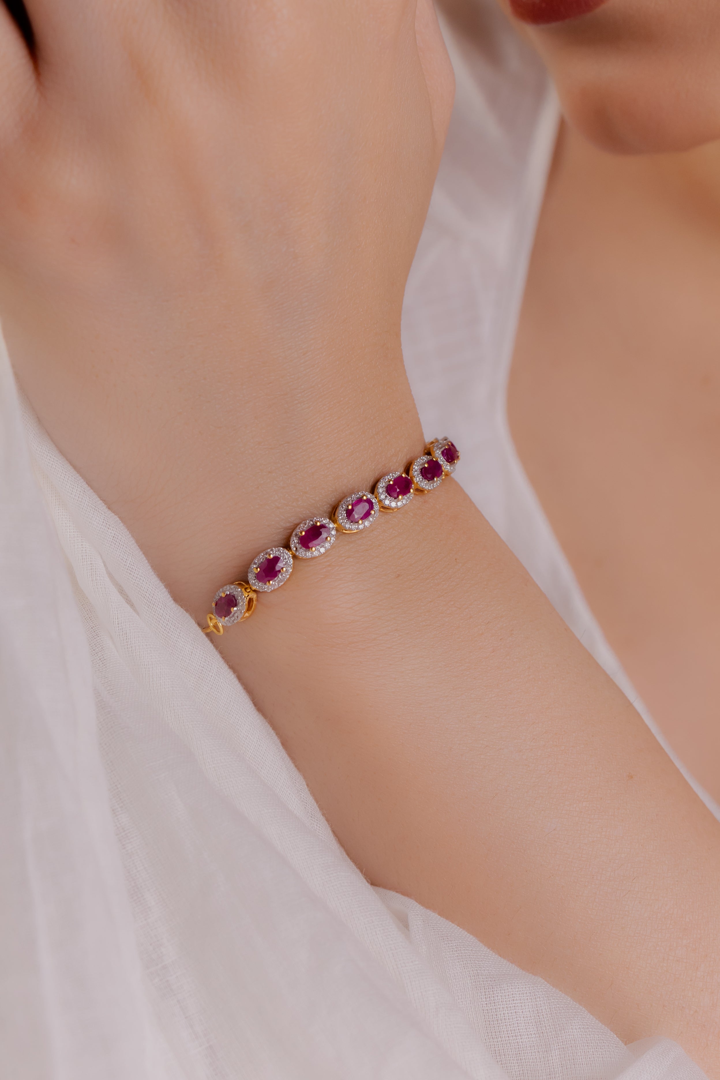 4K GOLD HALF TENNIS RUBY BRACELET