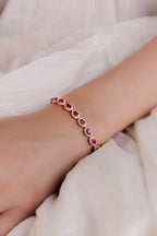 4K GOLD HALF TENNIS RUBY BRACELET